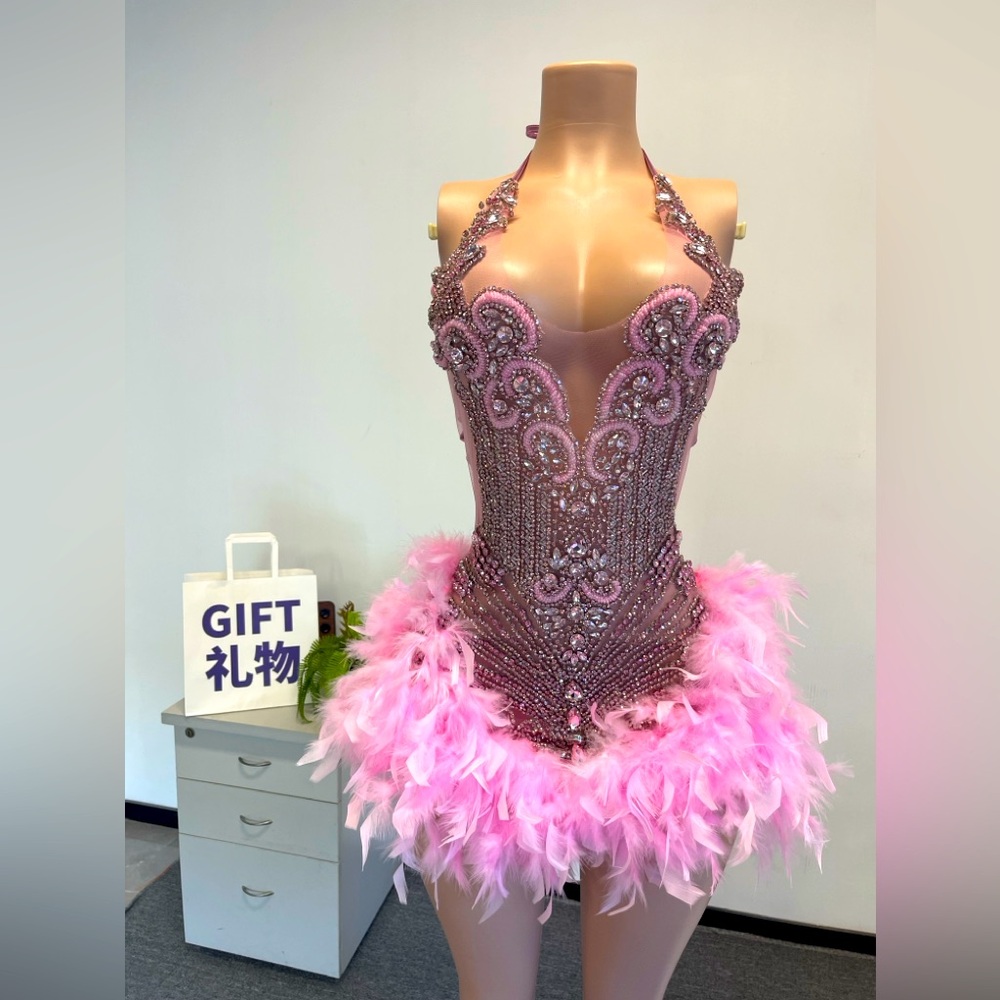 Pink birthday dress with feather